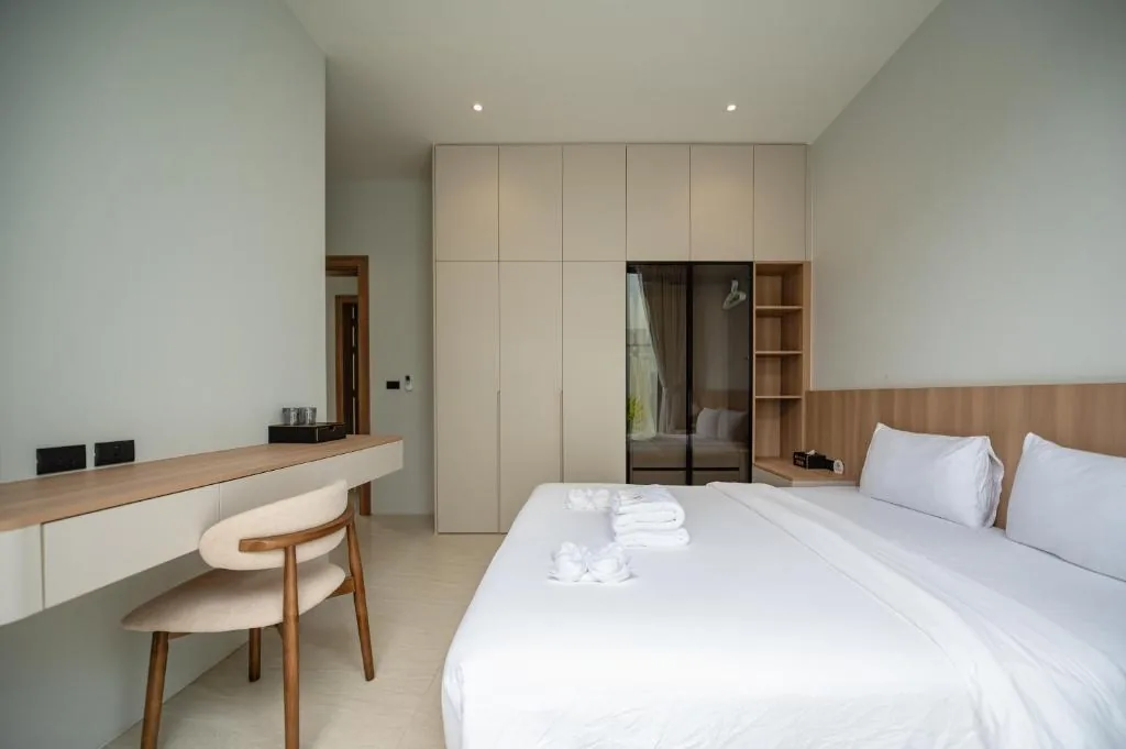 Villa second bedroom with wardrobe and workspace